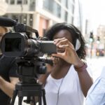 close-up-camera-crew-filming-interview
